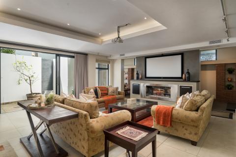 Lounge in Cellar with sliding doors to court yard