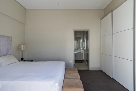 Flatlet bedroom with built-in cupboards